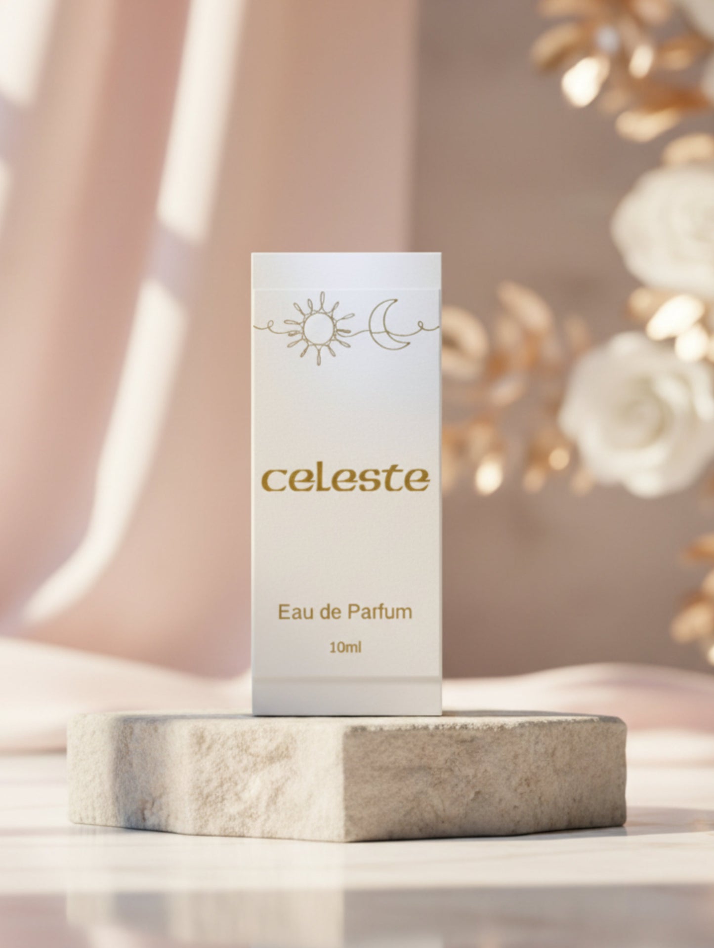 Celete Eau de Parfum packaging on a stone plinth with flowers and draped fabric in the background