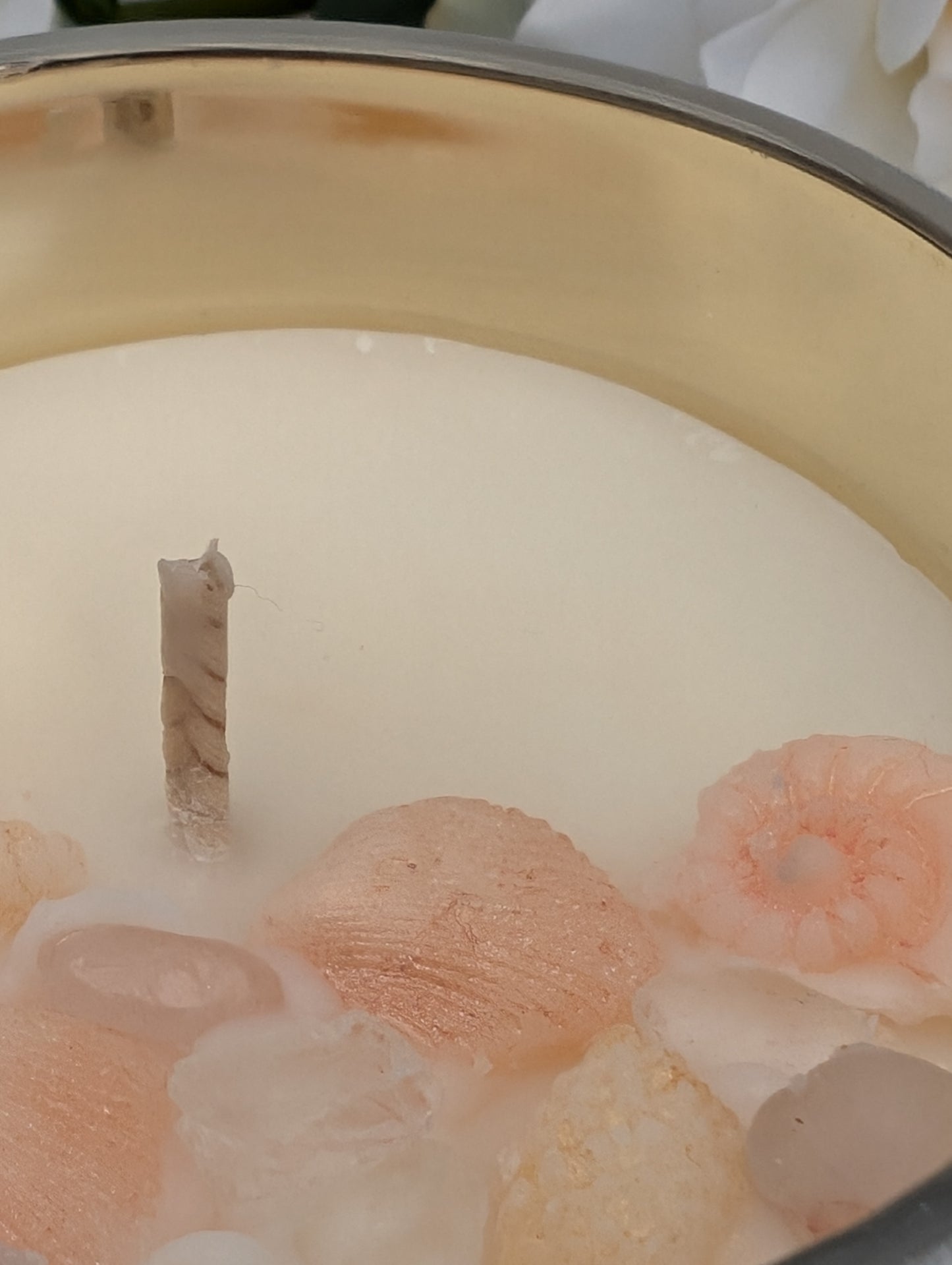 Close-up of Grace candle with wax shells and crystals