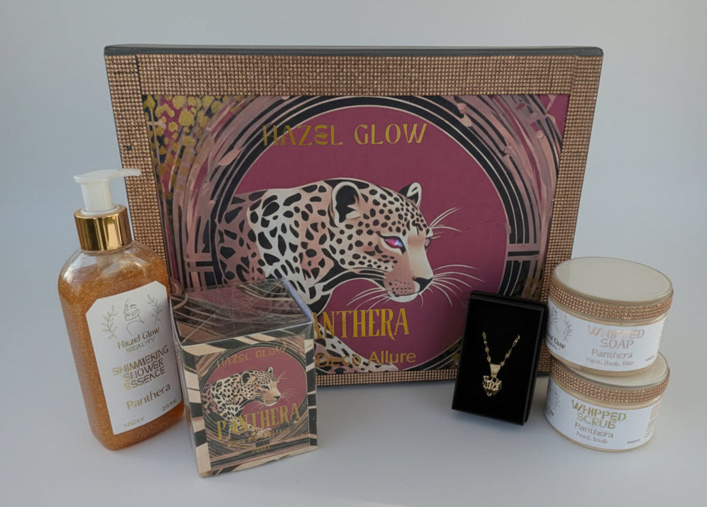 Collection of beauty products with a leopard-themed box on a white background