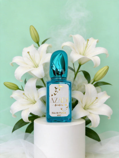 Azadi vegan perfume bottle with white flowers on a light green background