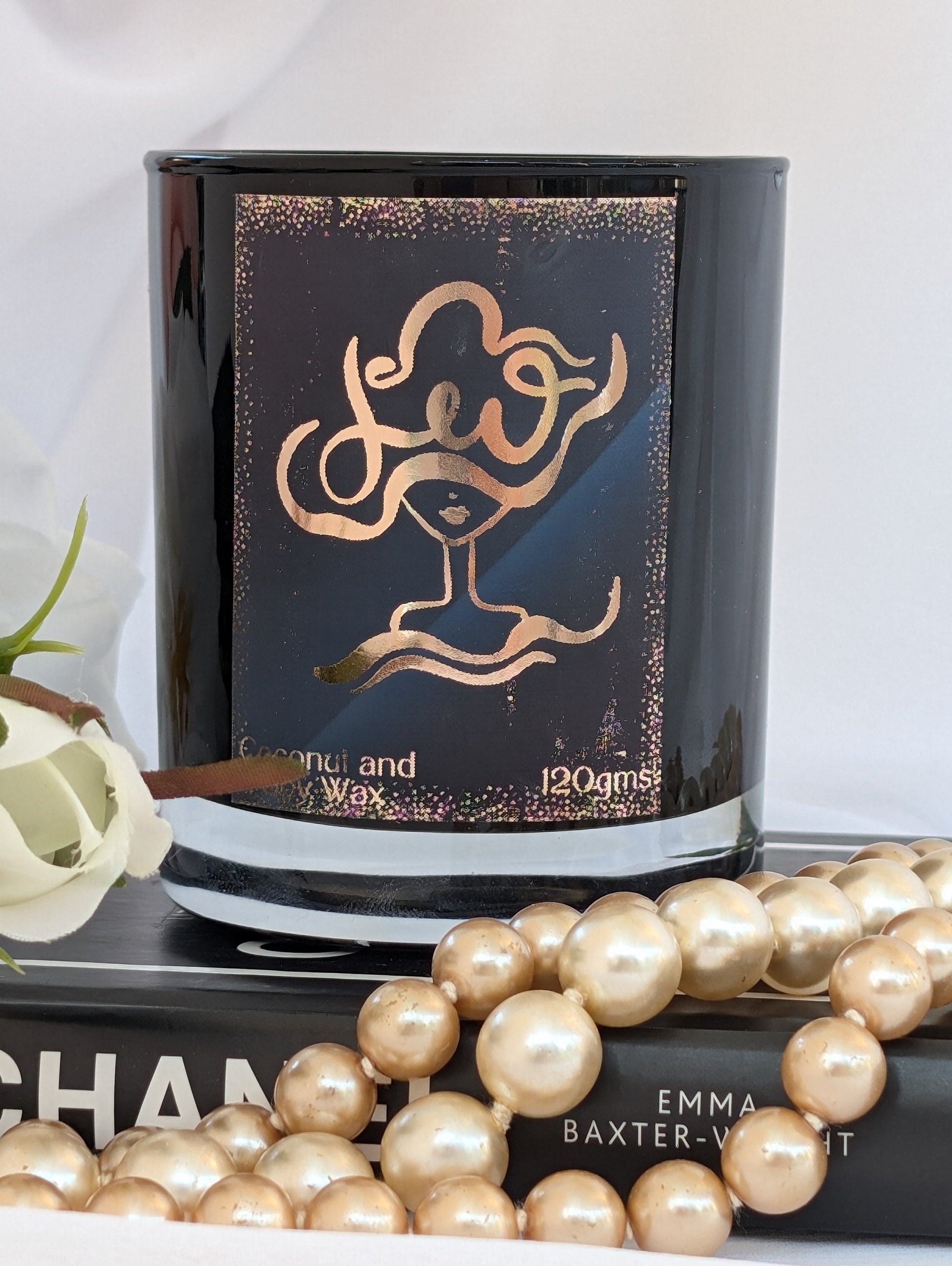 Close up of Black and Gold Leo Zodiac Candle