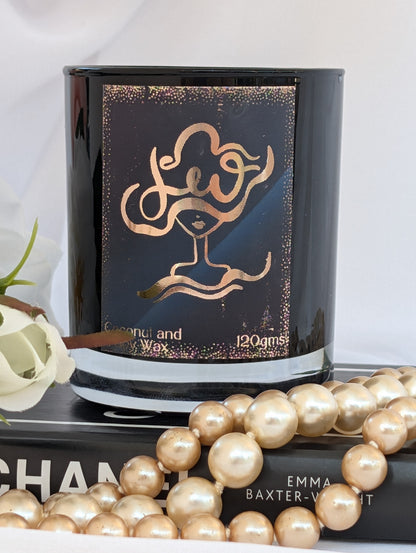 Close up of Black and Gold Leo Zodiac Candle