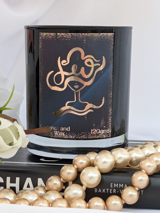 Close up of Black and Gold Leo Zodiac Candle