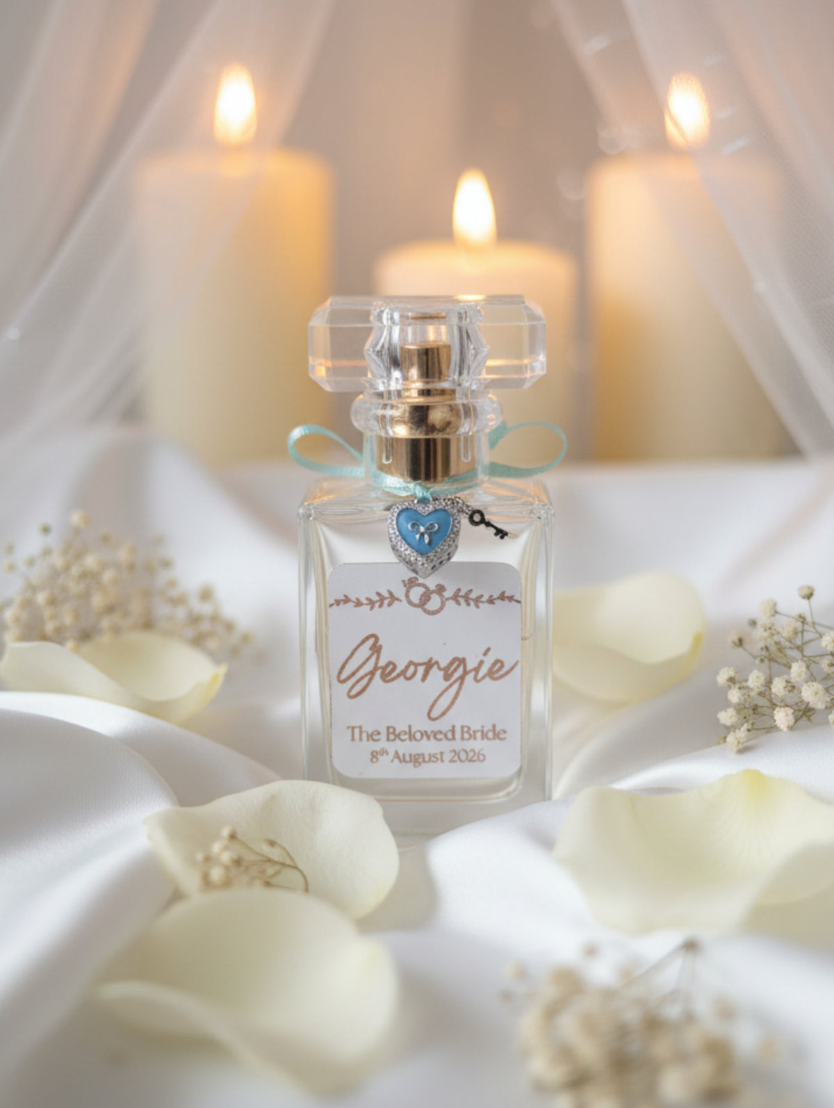 Bride's perfume - personalised wedding  'Georgie The Beloved Bride 8th August 2026', nestled in white shredded paper inside a gift box.