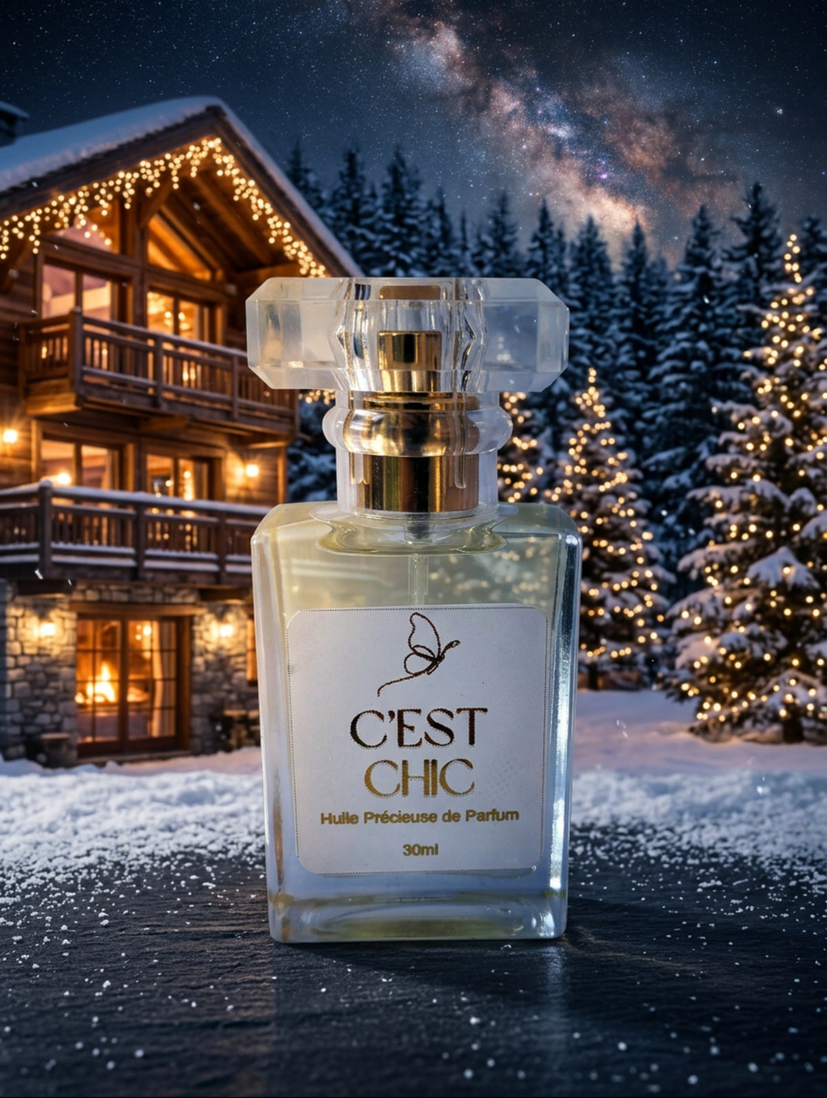 C'est Chic luxury perfumed spray oil by Hazel Glow.  Vegan, Cruelty Free and Paraben Free.  Glass bottle with faceted lid shown against a winter alpine setting