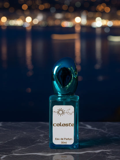 Celeste Vegan Perfume by Hazel Glow in turquoise blue refillable bottle with gold foiled label