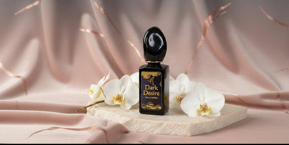 Perfume bottle labeled 'Dark Desire' with white orchids on a beige background