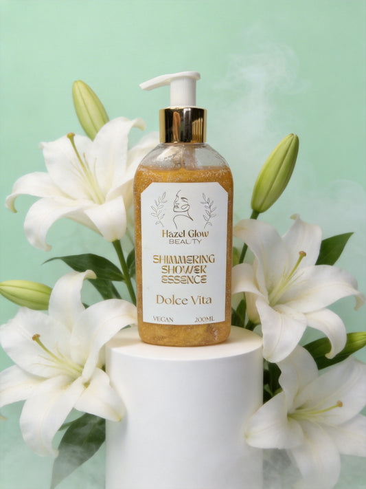 Luxury Body Wash, Vegan Shower Gel Dolce Vita by Hazel Glow on white plinth surrounding by lilies