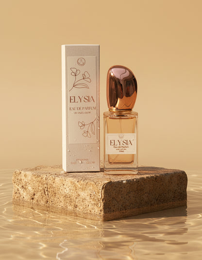 Elysia perfume bottle and packaging on a stone and water