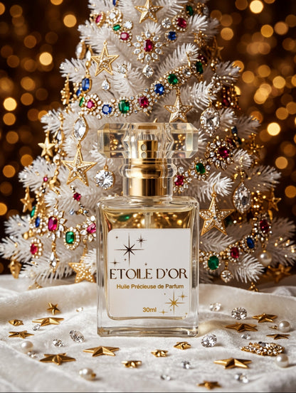 Luxury Perfume oil spray by Hazel Glow in Etoile D'Or fragrance.  Vegan, cruetly free and paraben free, made with non greasy fractionated coconut oil.  shown against a luxury bejewelled white Christmas tree
