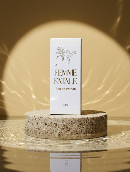 Femme Fatale Eau de Parfum packaging on a marble surface