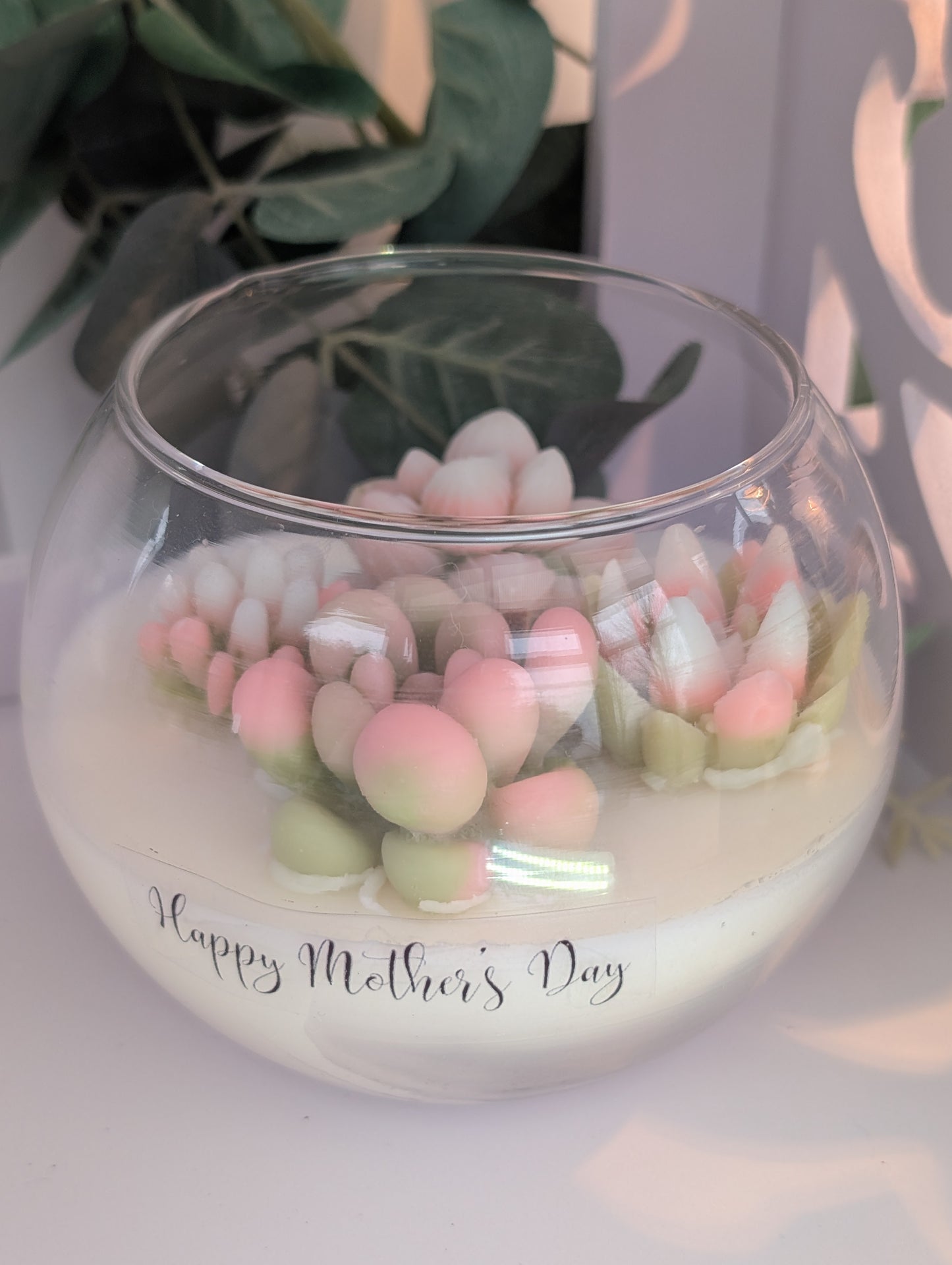 Thoughful Mothers day gifts - beautiful hand poured vegan candle with hand poured hand coloured succulent decoration in clear glass fish bowl  shaped candle container with Happy Mother's Day clear 