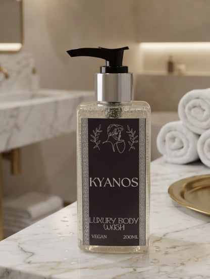 A 200ml bottle of Kyanos Luxury Body Wash with a black pump dispenser and a black and silver foiled label shown in a luxury marble bathroom

