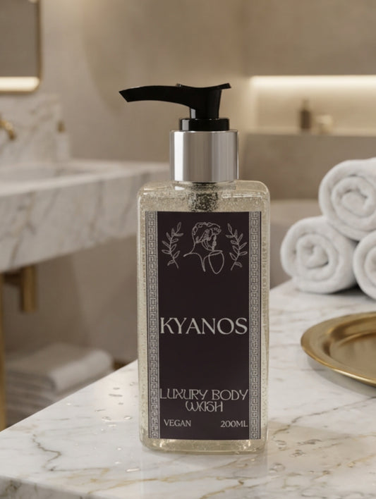 A 200ml bottle of Kyanos Luxury Body Wash with a black pump dispenser and a black and silver foiled label shown in a luxury marble bathroom
