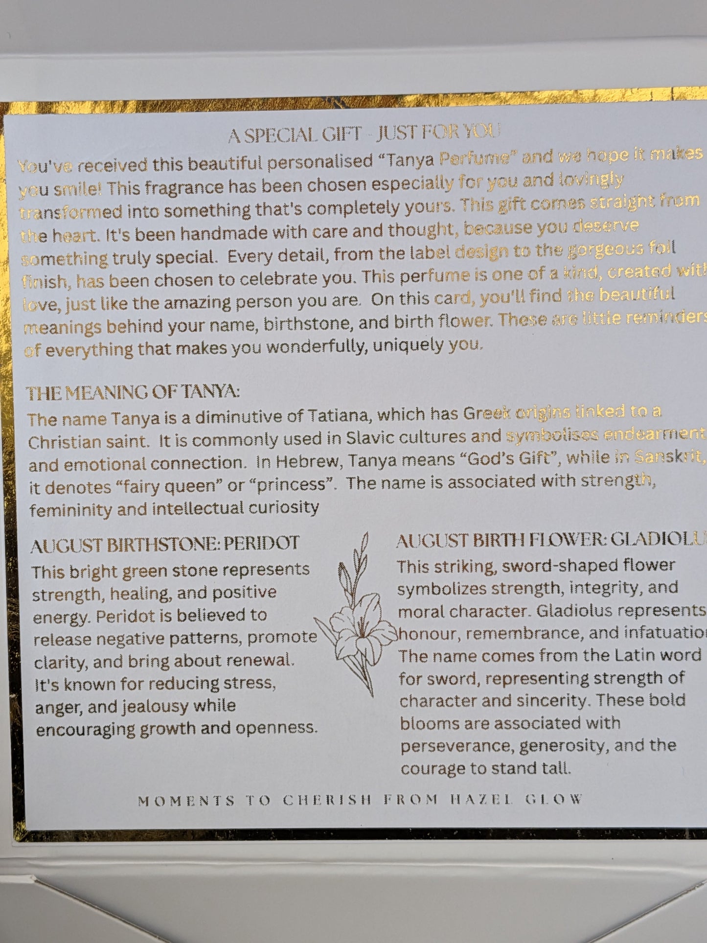 Inside detail of personalised perfume box, featuring name meaning, birthstone and birthflower, foiled