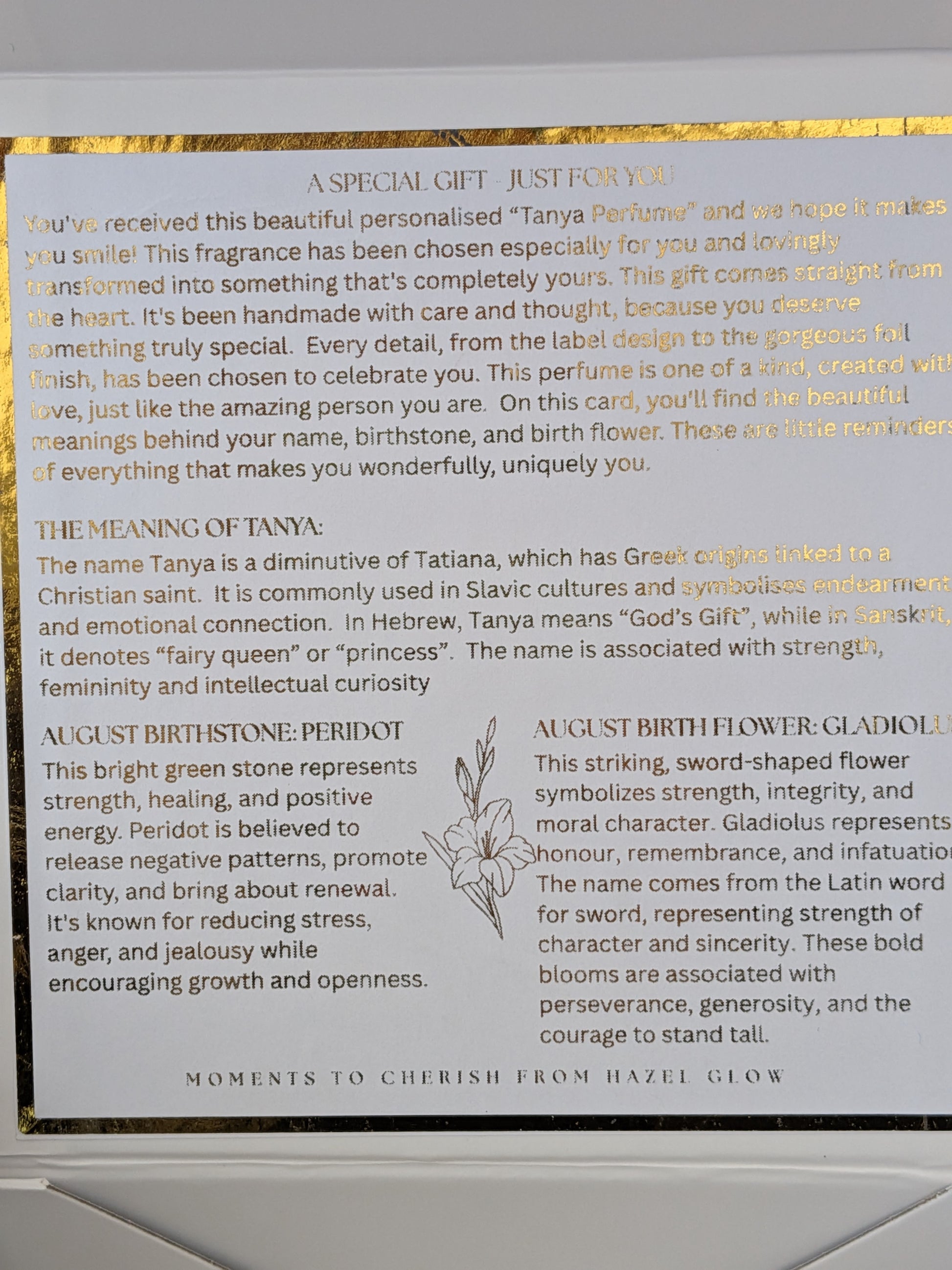 Inside detail of personalised perfume box, featuring name meaning, birthstone and birthflower, foiled
