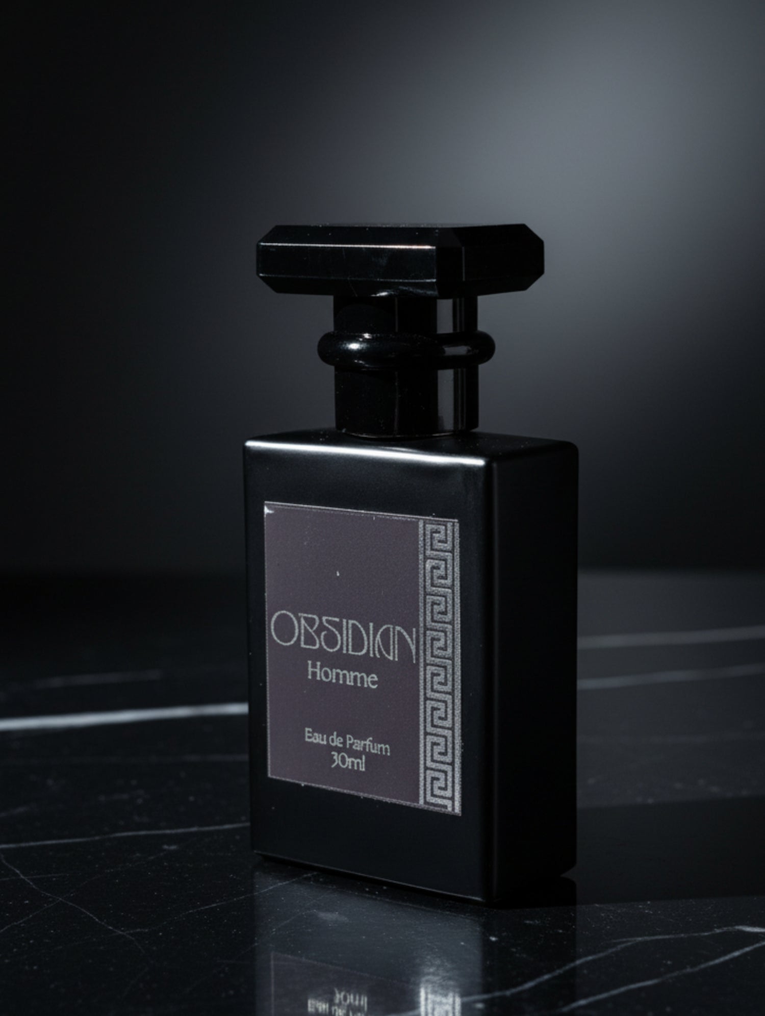 Leather Perfume Obsidian by Hazel Glow in black bottle with black and silver foil label