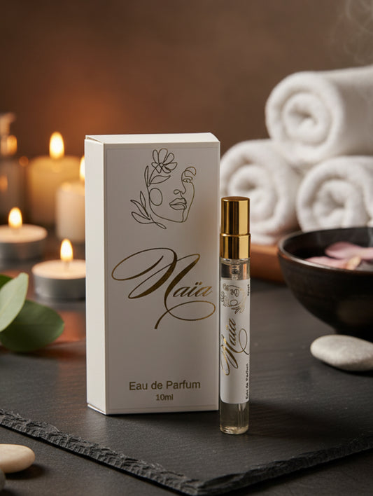 Naia luxury vegan perfume by Hazel Glow.  10ml discovery size box and bottle with design in gold foil
