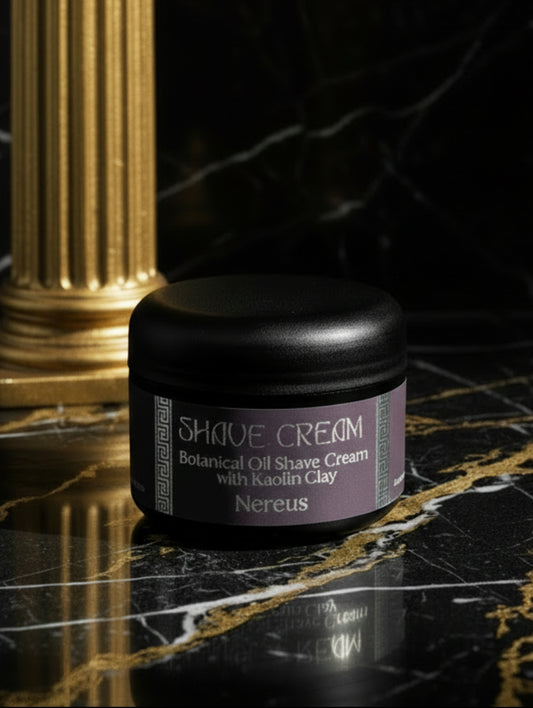 Vegan Shave Cream in Nereus fragrance by Hazel Glow on a black and gold marble surface with gold ionic column in the background