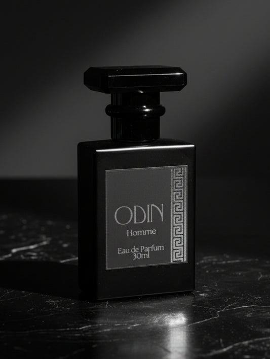 Odin men's perfume by Hazel Glow.  Black perfume bottle with black label and silver foil design
