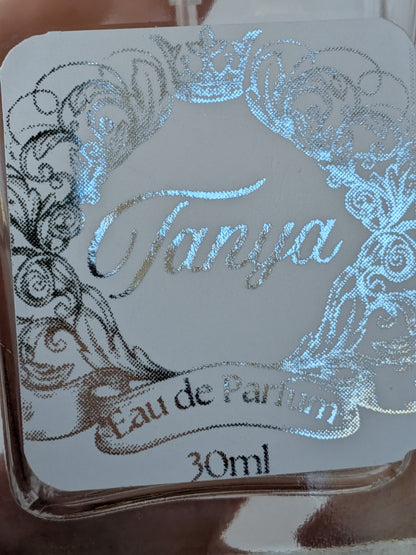 Close up detail of ornate personalised perfume bottle label