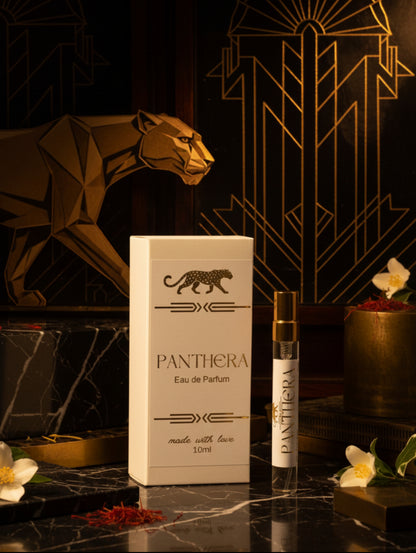 Panthera trial size 10ml vegan perfume bottle with packaging against an art deco style background - by Hazel Glow