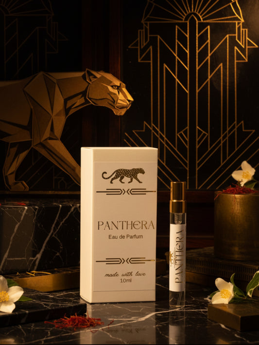 Panthera trial size 10ml vegan perfume bottle with packaging against an art deco style background - by Hazel Glow