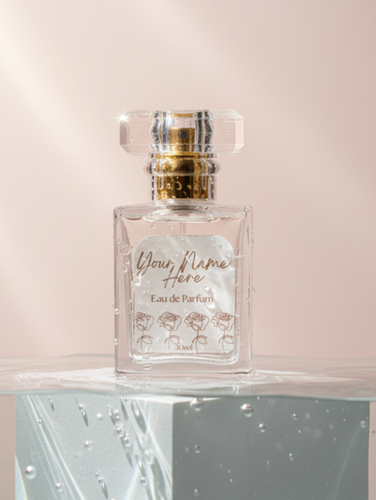 Perfume bottle labeled 'Doux Flame Here' on a reflective surface with a soft pink background