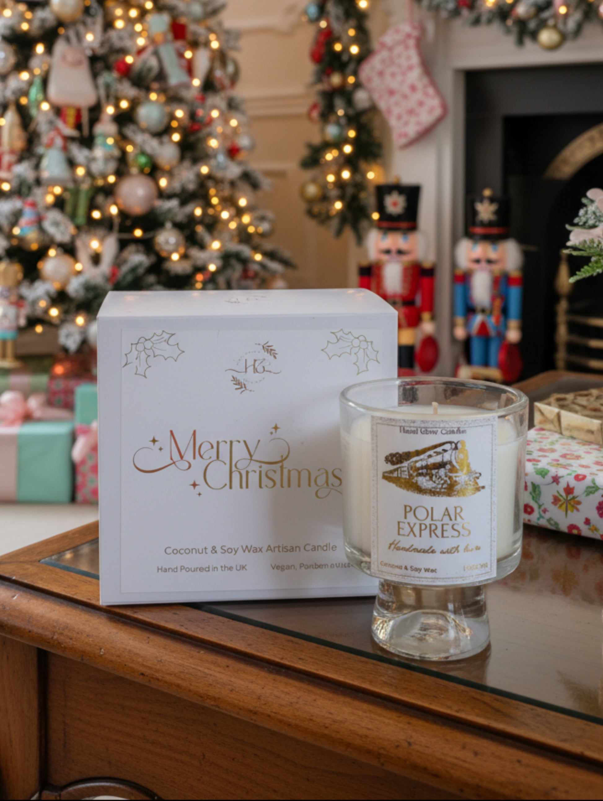 Polar Express Christmas Candle from Hazel Glow.  Gold Foil design label, cocktail style glass in a keepsake rigid magnetic box.Coconut and soy eco wax clean burning, paraben free, cruelty free and vegan.