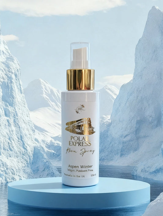 Polar Express Festive Room Spray from Hazel Glow in Aspen Winter Fragrance.  Against a backdrop of snowy mountains