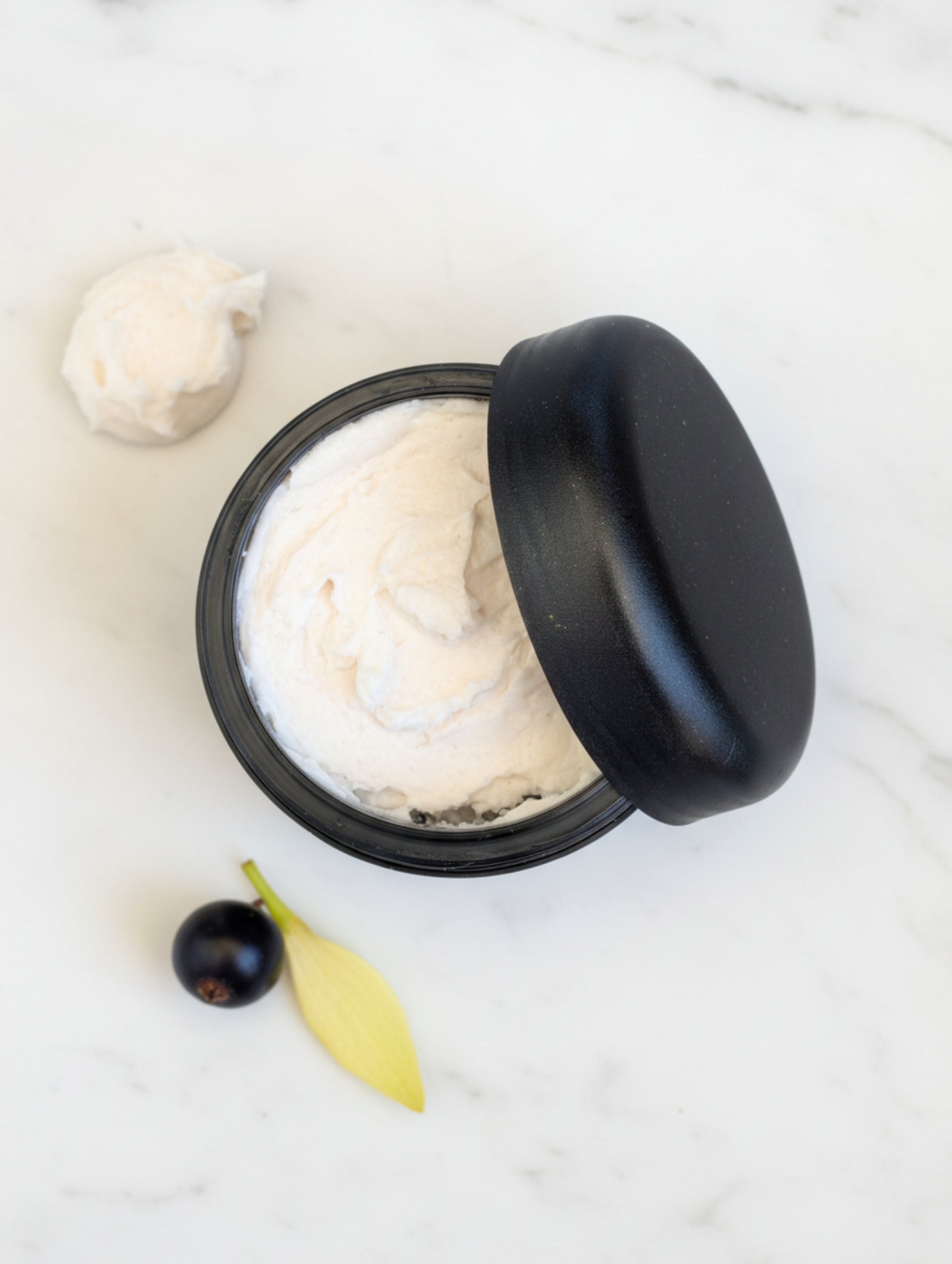 Open jar of Byzantium Shave Cream by Hazel Glow in Black jar 
