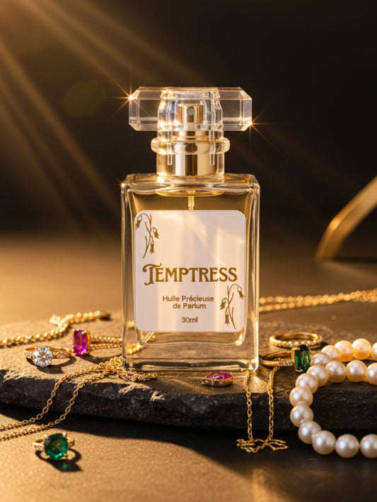 Vegan Perfume Oil Temptress by Hazel Glow on stone plinth with jewels and pearls