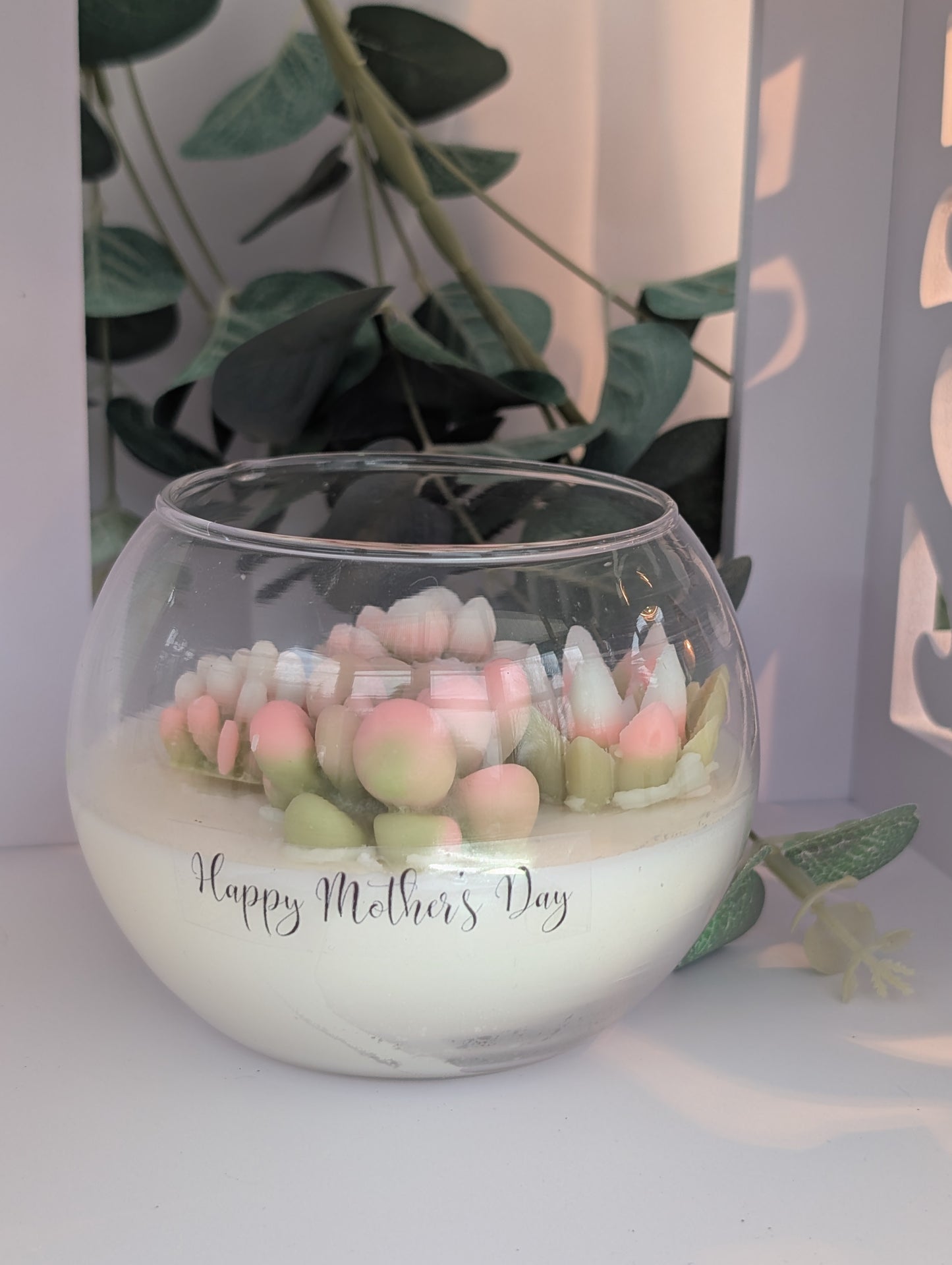 Best Mothers day gifts - beautiful hand poured vegan candle with hand poured hand coloured succulent decoration in clear glass fish bowl  shaped candle container with Happy Mother's Day clear 