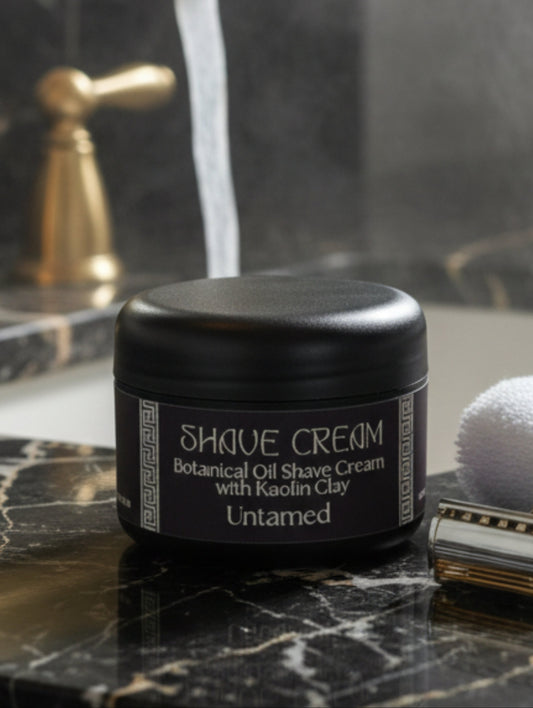 Shave Cream for Men - Untamed by Hazel Glow.  On black and white marble sink with gold taps in the background