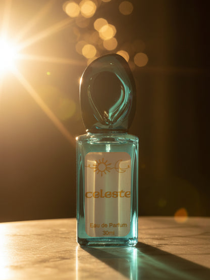 Vegan perfume Celeste by Hazel Glow in a turquoise bottle with sculptural metallic cap