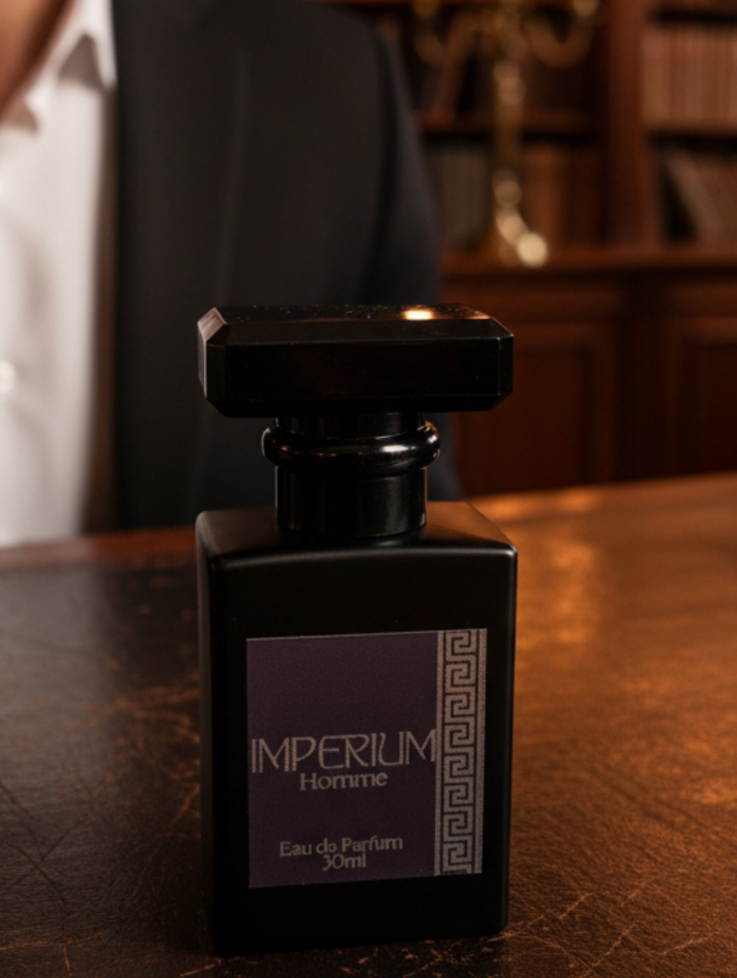 Imperium men's perfume by Hazel Glow.  30ml vegan men's fragrance in  black matte glass bottle with black label and silver foil detail.