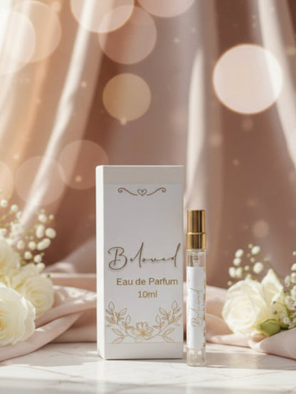 B. Marmont eau de parfum bottle and packaging with white roses on a soft background