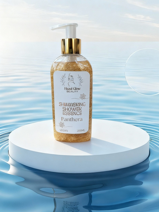 Bottle of 'Panthera' shower essence on a white platform with water background