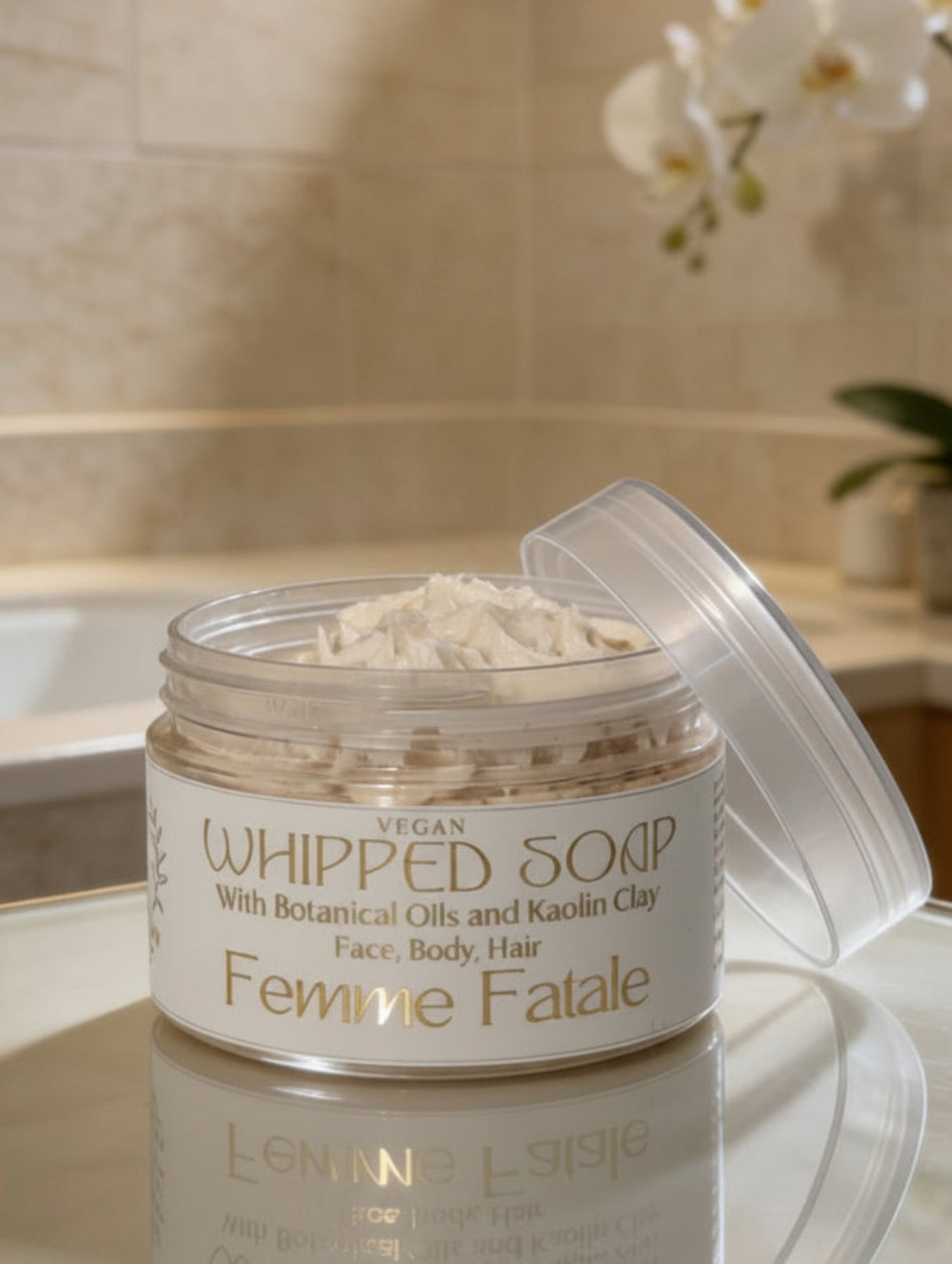 Jar of whipped soap labeled 'Ferriere Fatale' on a bathroom counter 