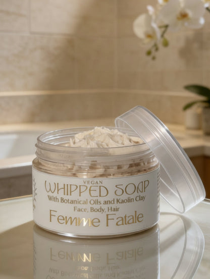 Jar of whipped soap labeled 'Ferriere Fatale' on a bathroom counter 